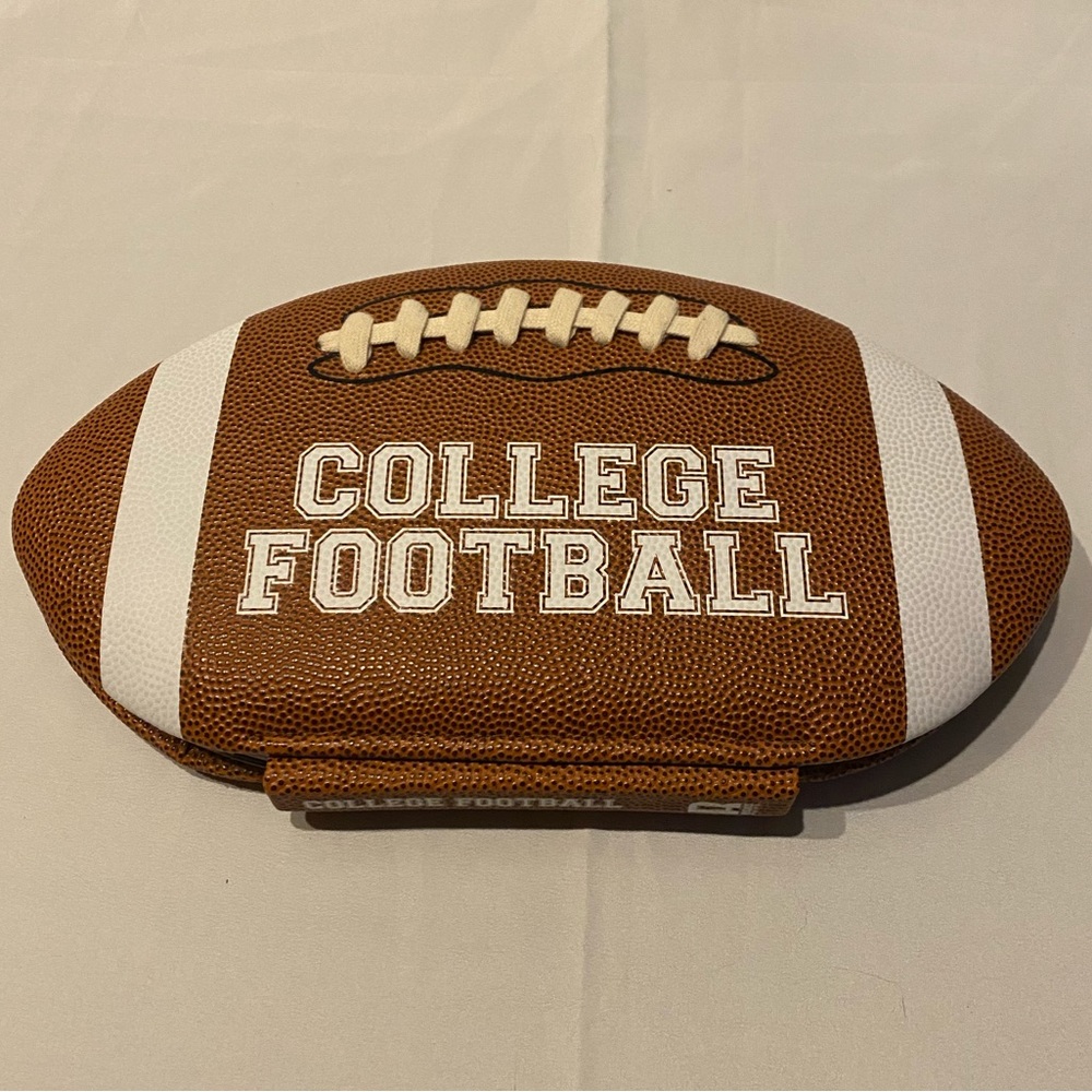 College Football book. Has the look an feel of a football.